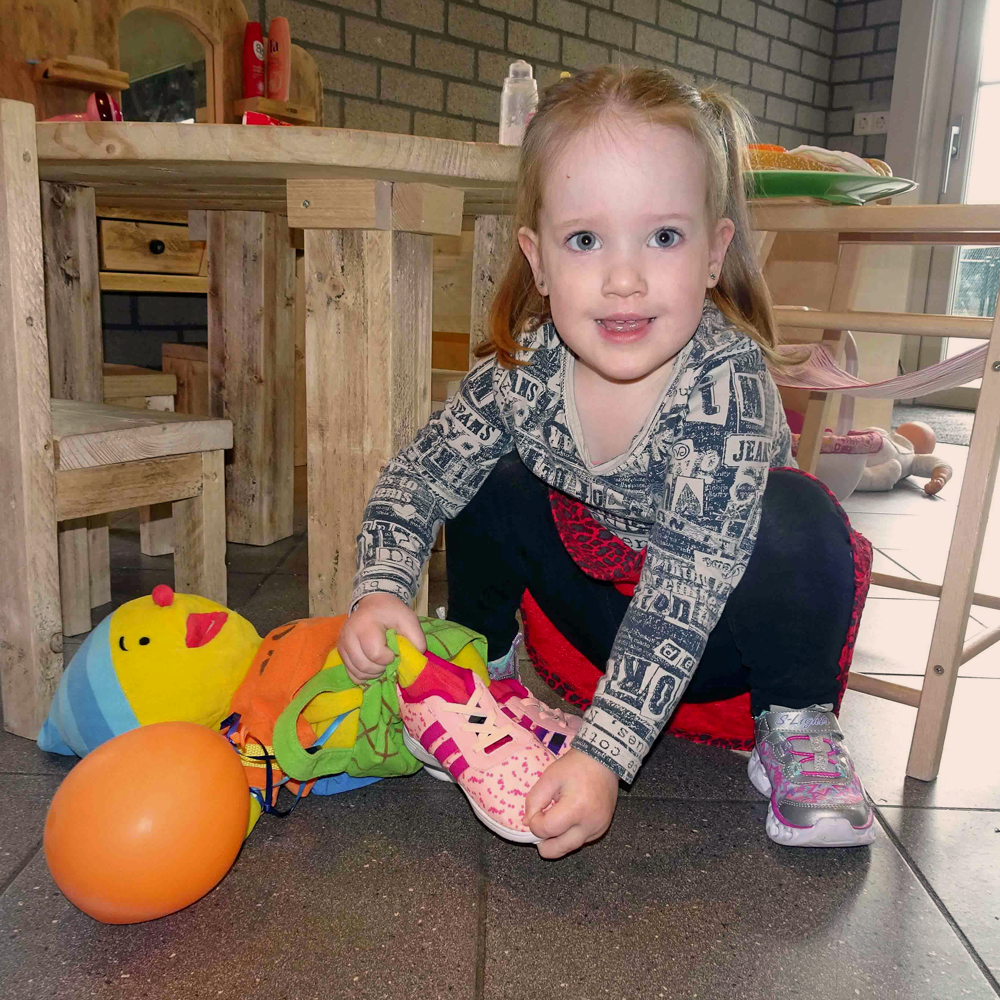 Peuterspeelzaal-met-puk Begin van de dag bij kinderdagverblijf